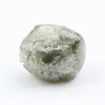 grey colour uncut raw diamond ring and pictures of a raw diamond collection