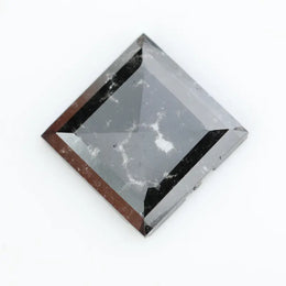 Lab-grown diamond with a pyramid cut showcasing brilliance and clarity, perfect for ethical and sustainable fine jewelry creations.