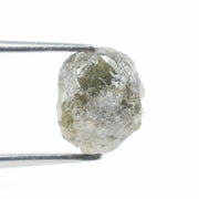 grey colour uncut raw diamond ring and pictures of a raw diamond collection