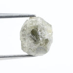 grey colour uncut raw diamond ring and pictures of a raw diamond collection