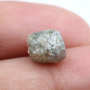 grey colour uncut raw diamond ring and pictures of a raw diamond collection
