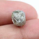 grey colour uncut raw diamond ring and pictures of a raw diamond collection