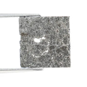 Lab-grown diamond with a pyramid cut showcasing brilliance and clarity, perfect for ethical and sustainable fine jewelry creations.
