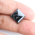 Lab-grown diamond with a pyramid cut showcasing brilliance and clarity, perfect for ethical and sustainable fine jewelry creations.
