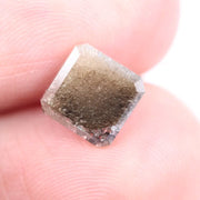 1.67 Ct fancy brown emerald cut lab grown diamond loose stone with warm sparkle and structured facets