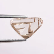 1.00 Ct brown and white trillion cut lab grown diamond loose stone with sharp triangular facets, ideal for engagement rings and modern designer jewelry.