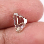 1.00 Ct brown and white trillion cut lab grown diamond loose stone with sharp triangular facets, ideal for engagement rings and modern designer jewelry.