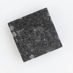 Luxurious square-cut lab-grown black diamond with a stunning, clear polished surface, offering eco-friendly elegance for fine jewelry pieces.