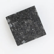 Luxurious square-cut lab-grown black diamond with a stunning, clear polished surface, offering eco-friendly elegance for fine jewelry pieces.