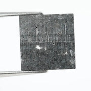 Luxurious square-cut lab-grown black diamond with a stunning, clear polished surface, offering eco-friendly elegance for fine jewelry pieces.