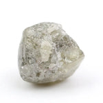 grey colour rough of a raw diamond and pure diamonds collection
