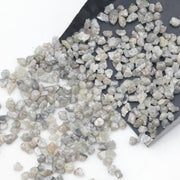 light grey and brown natural diamond chips with a raw uncut appearance