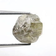 grey colour rough of a raw diamond and pure diamonds collection
