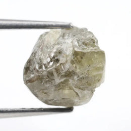 grey colour rough of a raw diamond and pure diamonds collection