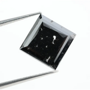 Luxurious square-cut lab-grown black diamond with a stunning, clear polished surface, offering eco-friendly elegance for fine jewelry pieces.