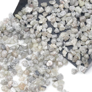 light grey and brown natural diamond chips with a raw uncut appearance
