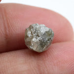 grey colour rough of a raw diamond and pure diamonds collection