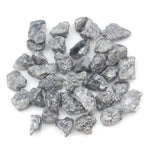 black raw diamond with a natural uncut rough surface for jewelry design projects