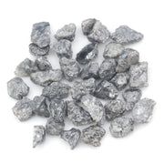black raw diamond with a natural uncut rough surface for jewelry design projects