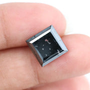 Luxurious square-cut lab-grown black diamond with a stunning, clear polished surface, offering eco-friendly elegance for fine jewelry pieces.