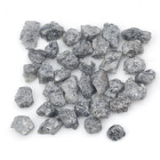black raw diamond with a natural uncut rough surface for jewelry design projects