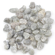 light grey raw diamond with an uncut rough profile for jewelry creation