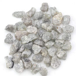 light grey raw diamond with an uncut rough profile for jewelry creation
