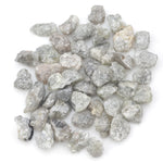 light grey raw diamond with an uncut rough profile for jewelry creation