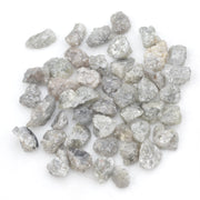 light grey raw diamond with an uncut rough profile for jewelry creation
