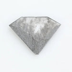 Faceted lab-grown black and white diamond with unique marbled inclusions, perfect for rings, pendants, and ethical jewelry designs.