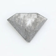 Faceted lab-grown black and white diamond with unique marbled inclusions, perfect for rings, pendants, and ethical jewelry designs.