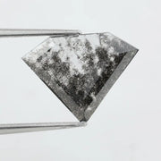Faceted lab-grown black and white diamond with unique marbled inclusions, perfect for rings, pendants, and ethical jewelry designs.