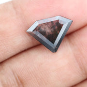 Faceted lab-grown black and white diamond with unique marbled inclusions, perfect for rings, pendants, and ethical jewelry designs.