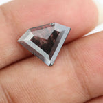 Faceted lab-grown black and white diamond with unique marbled inclusions, perfect for rings, pendants, and ethical jewelry designs.