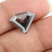 Faceted lab-grown black and white diamond with unique marbled inclusions, perfect for rings, pendants, and ethical jewelry designs.