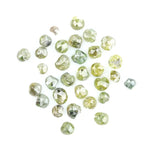 Natural green diamond with rare earthy green color, loose gemstone displaying brilliance and unique natural crystal characteristics.