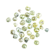 Natural green diamond with rare earthy green color, loose gemstone displaying brilliance and unique natural crystal characteristics.