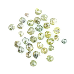 Natural green diamond with rare earthy green color, loose gemstone displaying brilliance and unique natural crystal characteristics.