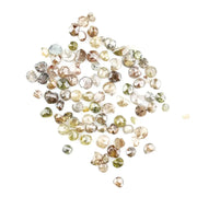 Natural multi colour rough diamonds with yellow, grey, champagne and white tones displayed on white background.