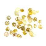 Discover premium natural yellow diamonds featuring vibrant lemon to deep golden hues.