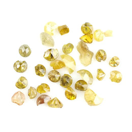 Discover premium natural yellow diamonds featuring vibrant lemon to deep golden hues.