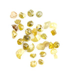 Discover premium natural yellow diamonds featuring vibrant lemon to deep golden hues.
