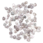 unique pink rough raw diamond with a natural uncut appearance for jewelry design