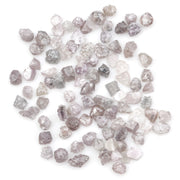 unique pink rough raw diamond with a natural uncut appearance for jewelry design