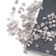 unique pink rough raw diamond with a natural uncut appearance for jewelry design