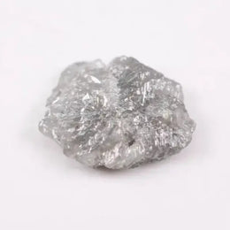 a raw diamond, natural diamond raw black diamond in rock, natural diamond rough, buy uncut diamonds, natural diamond engagement rings for sale, black faceted diamond