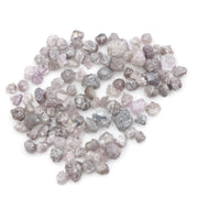 unique pink rough raw diamond with a natural uncut appearance for jewelry design