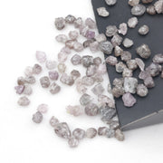 unique pink rough raw diamond with a natural uncut appearance for jewelry design