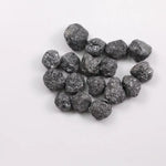 Black Diamond loose stone showcasing deep black color and polished surface for luxury jewelry design