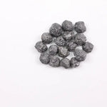 Black Diamond loose stone showcasing deep black color and polished surface for luxury jewelry design